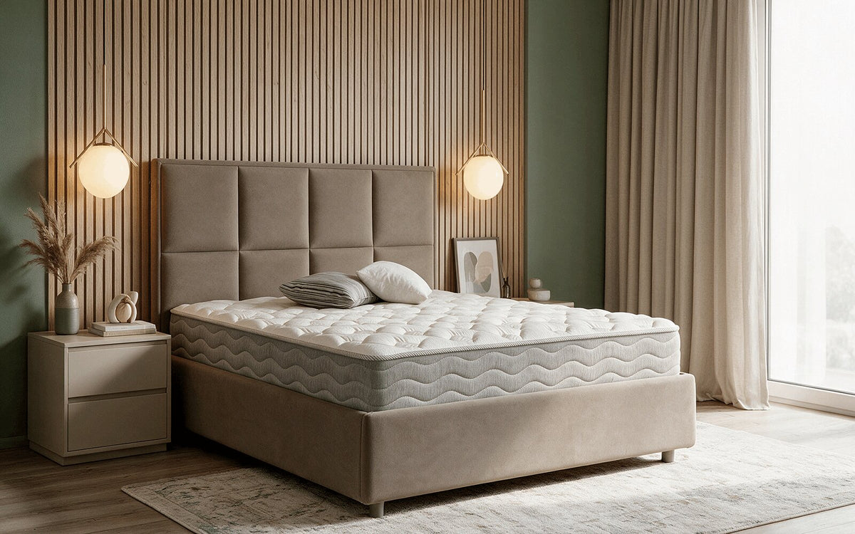 Flexy Spring mattress on an adjustable base in a cosy bedroom, showing its soft knitted quilted cover