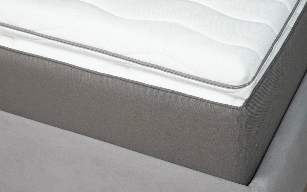 Cloud Flex Plus mattress pad in a bedroom interior
